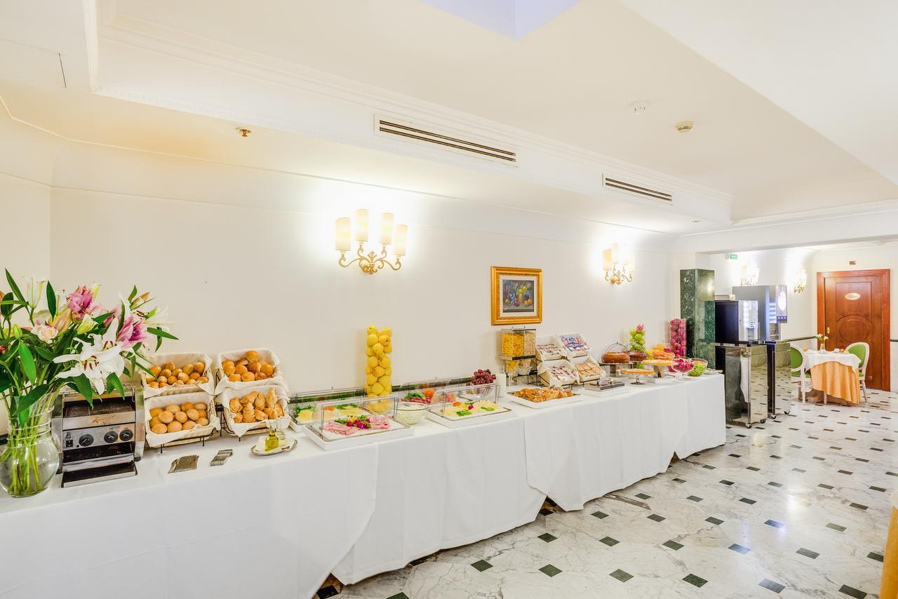 Raeli Hotel Regio Roma Esterno foto